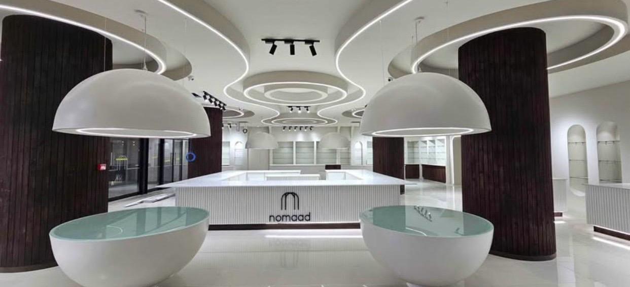 Retail store fit-out with curved ceiling and display counters